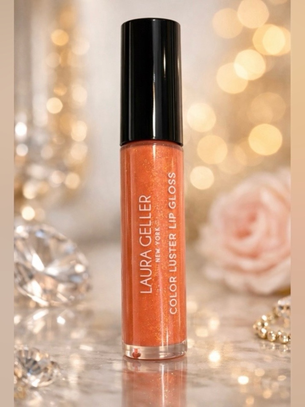 Laura Geller Color Luster Lip Gloss - Honey Caramel, a Shimmery Peachy Coral